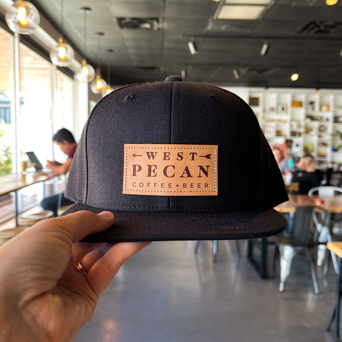 West Pecan Coffee+Beer branding in the wild Pound Design